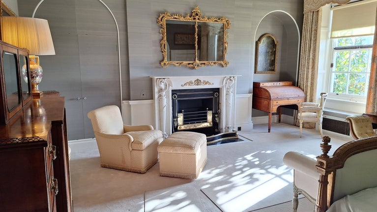 Interior of the South Suite bedroom at Hinton Ampner showing completed restoration work